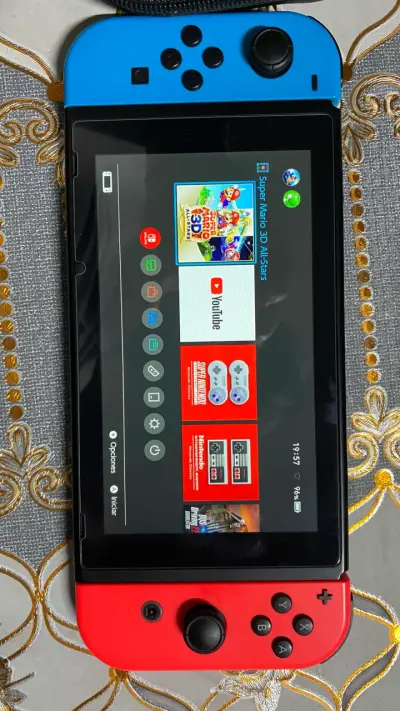 Nintendo Switch con juegos y accesorios - miniatura 2