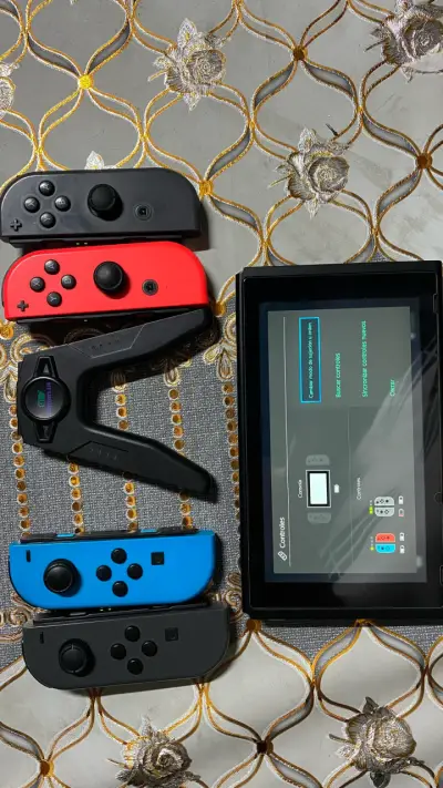 Nintendo Switch con juegos y accesorios - miniatura 4