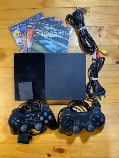 PlayStation 2 + Mandos + 10 Juegos + Bolso - miniatura 1