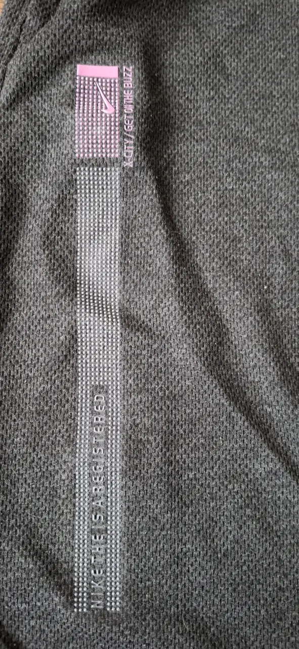 Pantalones deportivos Nike grises con cierre - 2
