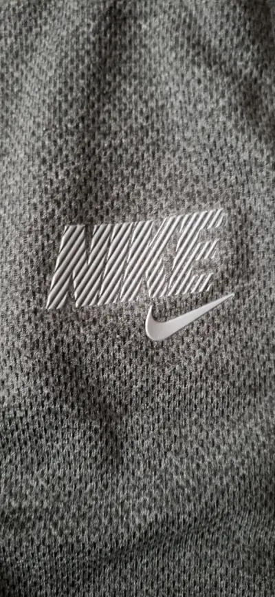 Pantalones deportivos Nike grises con cierre - miniatura 3