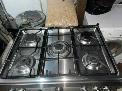 Cocina a gas con horno Bosch de acero inoxidable - miniatura 1