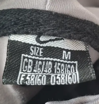 Chaqueta deportiva Nike gris con capucha - miniatura 5