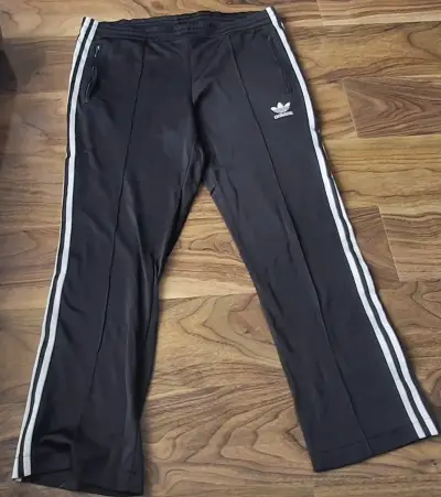 Pantalones deportivos Adidas negros con franjas - miniatura 1