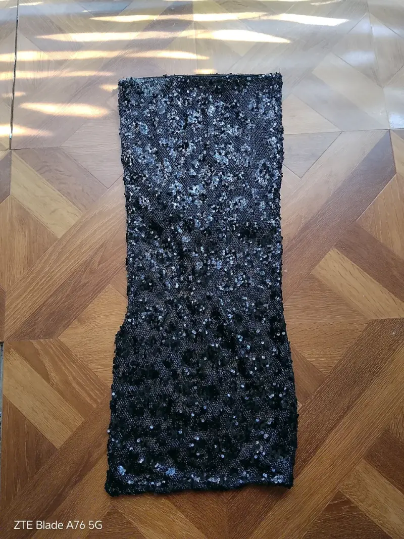 Falda larga negra con lentejuelas Sybilla