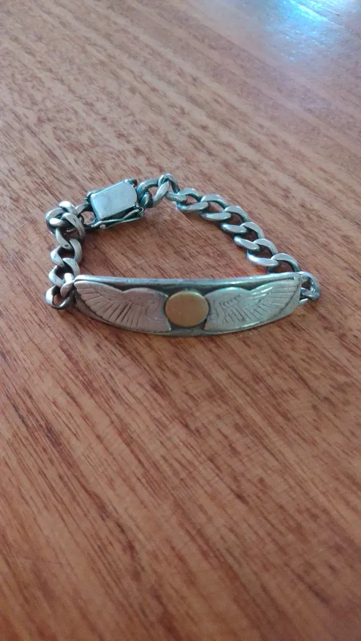 Pulsera de plata con oro diseño de alas