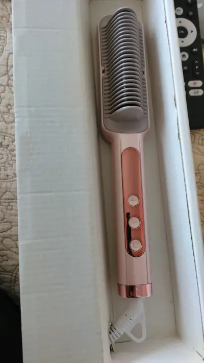 Cepillo alisador de cabello eléctrico rosa - miniatura 1
