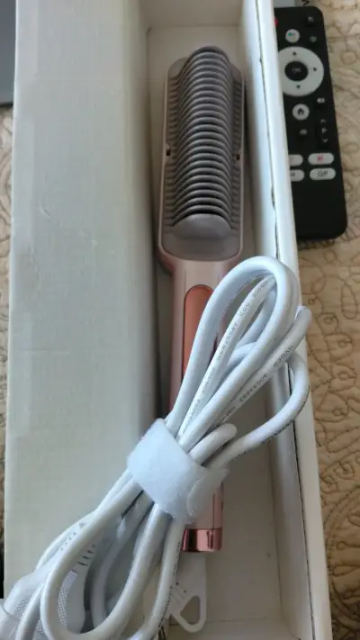 Cepillo alisador de cabello eléctrico rosa - miniatura 2