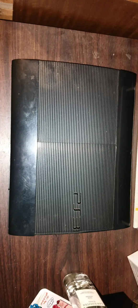Consola PlayStation 3 con control y juegos - 1
