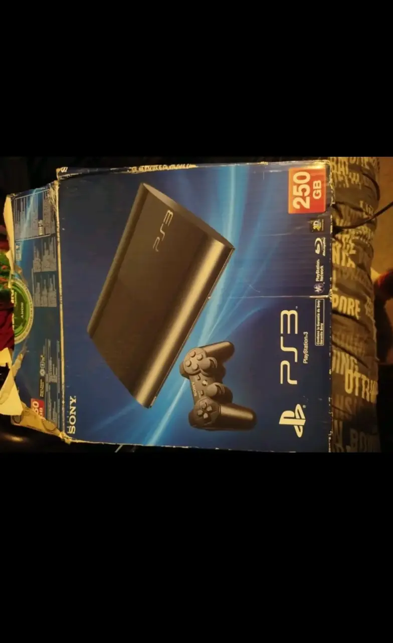 Consola PlayStation 3 con control y juegos - 5
