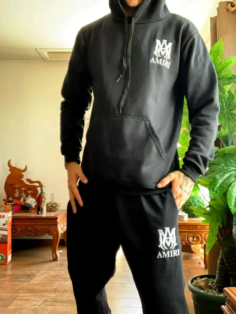 Conjunto de buzo Amiri para hombre en negro y rojo - 1