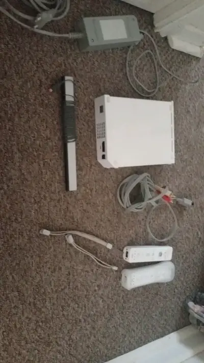 Consola Nintendo Wii con accesorios y controles - miniatura 1
