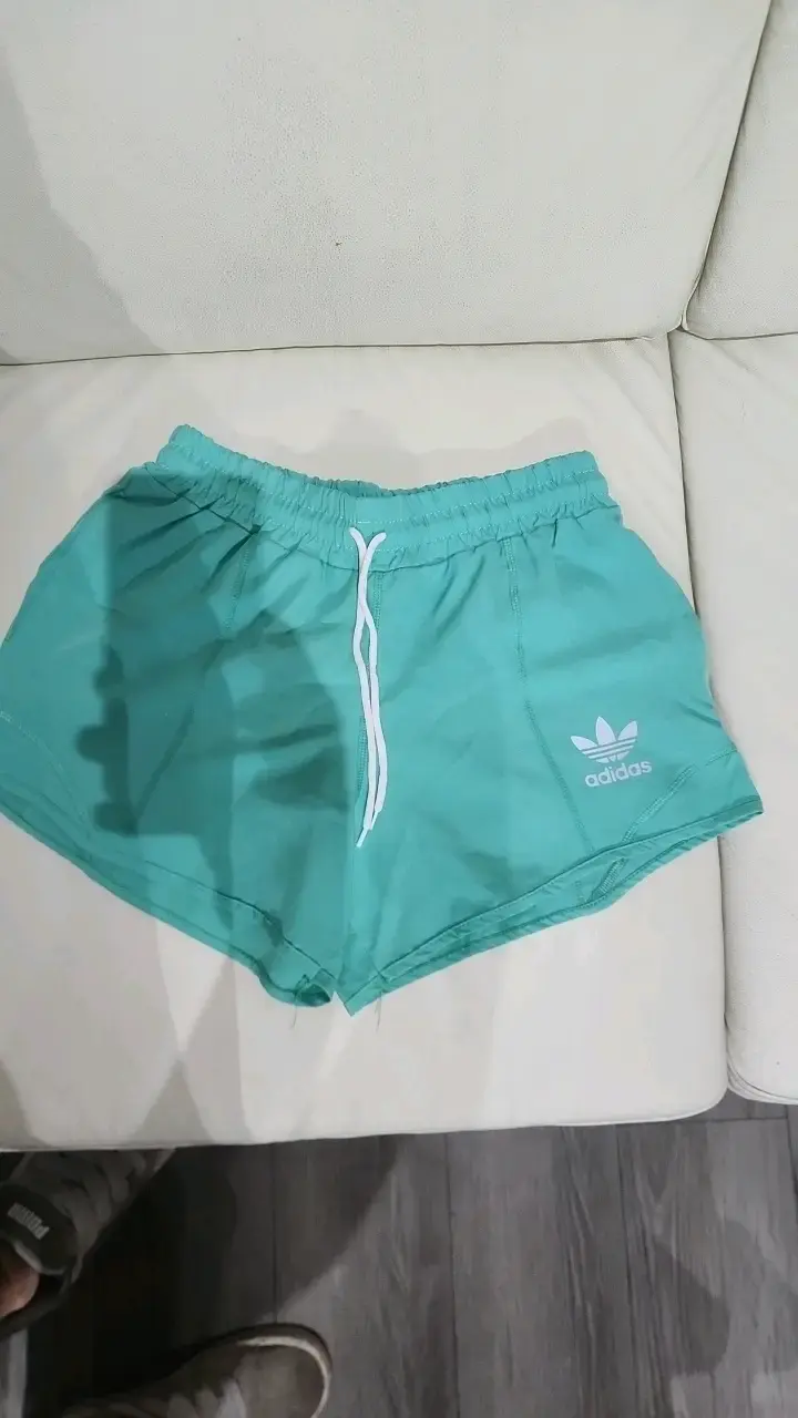 Shorts deportivos Adidas turquesa con logo