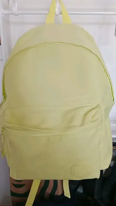 Mochila amarilla unisex con amplio compartimento - miniatura 1