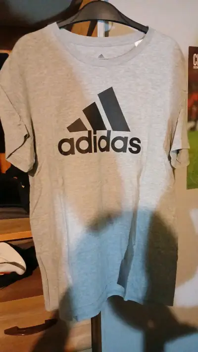 Polera gris Adidas Amplifier Tee - miniatura 1