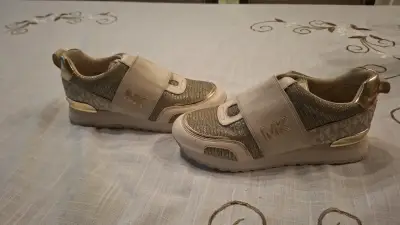 Zapatillas deportivas doradas MK para mujer - miniatura 1