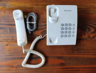 Teléfono fijo Panasonic blanco con cable - miniatura 1
