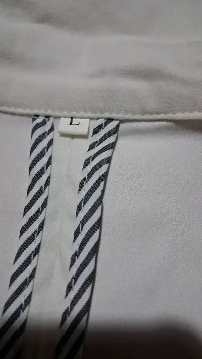 Blazer blanco con forro a rayas para mujer - miniatura 2