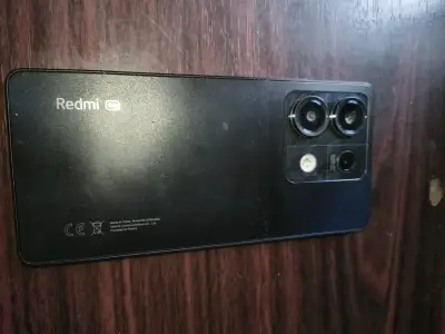 Smartphone Xiaomi Redmi con funda protectora - miniatura 2