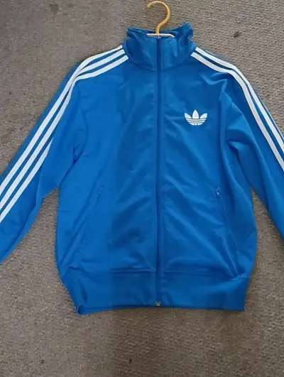 Chaqueta deportiva azul Adidas con logo - miniatura 1