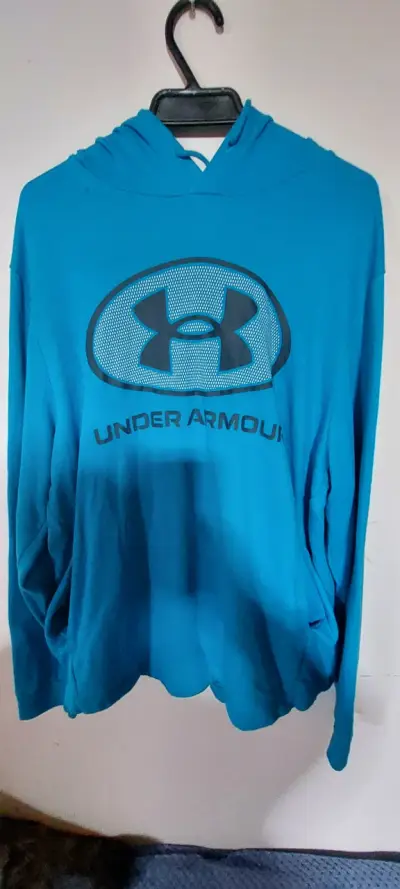 Polerón azul Under Armour con capucha - miniatura 1