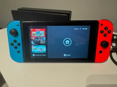 Consola Nintendo Switch Rojo/azul + Tarjeta De 64g - miniatura 1