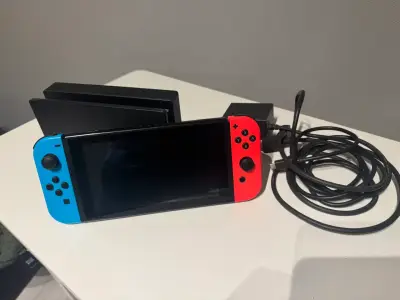 Consola Nintendo Switch Rojo/azul + Tarjeta De 64g - miniatura 2