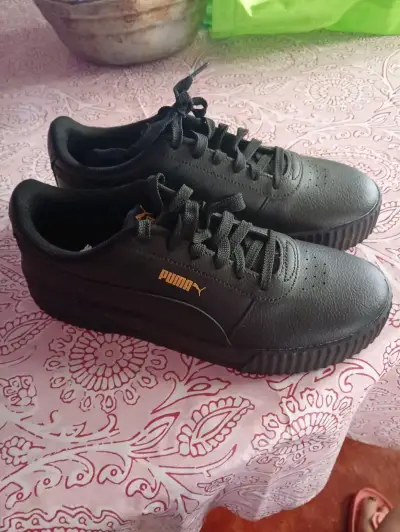 Zapatillas negras Puma para mujer - miniatura 1