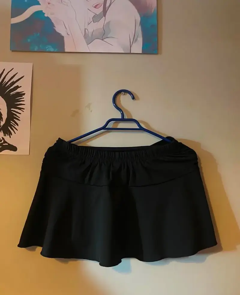 Falda corta negra con lazos - 3