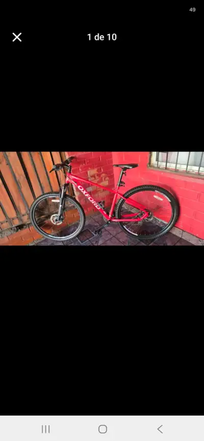 Bicicleta Oxford roja de montaña en buen estado - miniatura 1