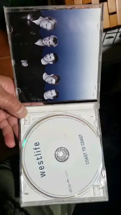 CD Westlife Coast to Coast en buen estado - miniatura 1