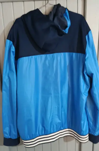 Chaqueta cortaviento azul Adidas con capucha - miniatura 2