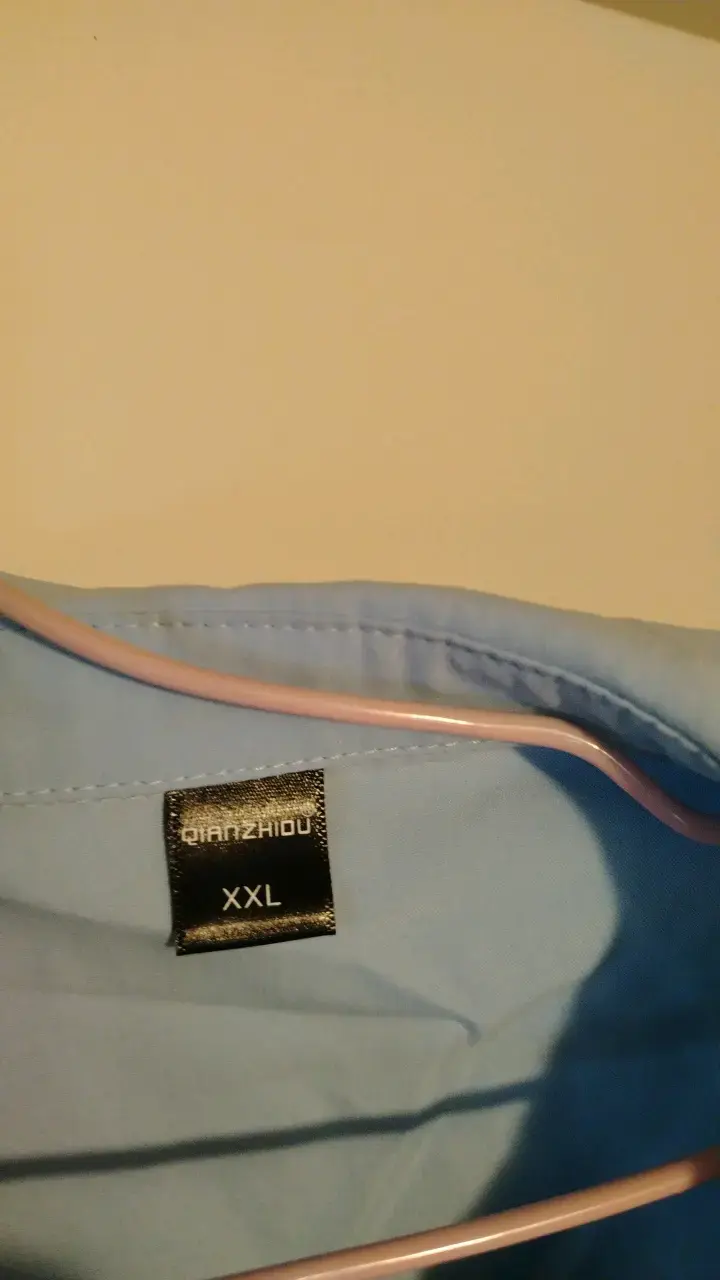 Blusa azul con cuello grande y volantes - 3