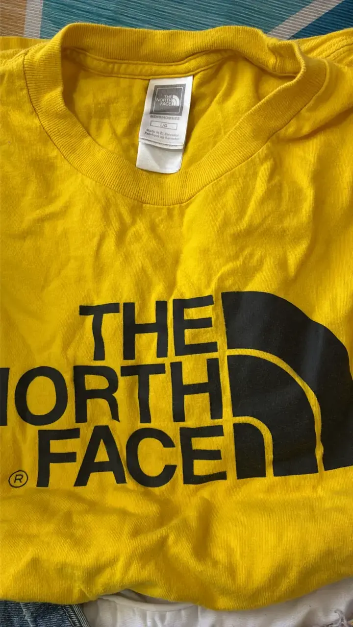 Polera amarilla The North Face para hombre - 1