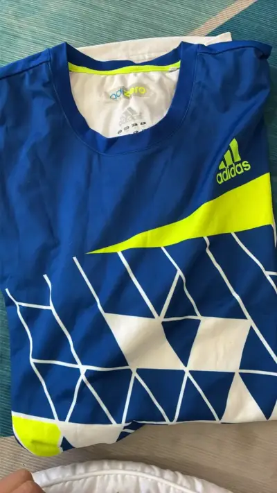 Polera deportiva Adidas Adizero azul y amarilla - miniatura 1
