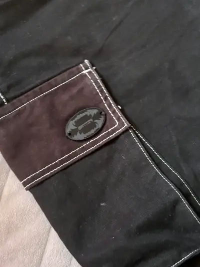 Pantalones cargo negros con bolsillos múltiples - miniatura 4