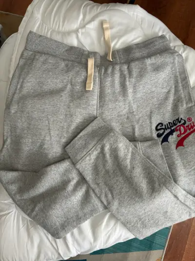 Pantalones deportivos grises Superdry para hombre - miniatura 1