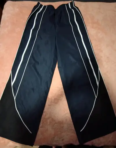 Pantalones deportivos azul marino con franjas blancas - miniatura 1