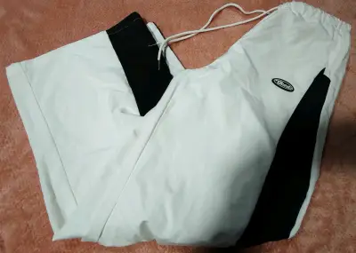 Pantalones deportivos blancos con franjas negras - miniatura 5