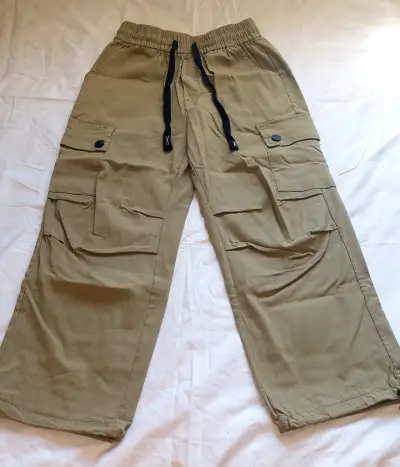 Pantalones cargo beige para niño/a  con bolsillos - miniatura 1