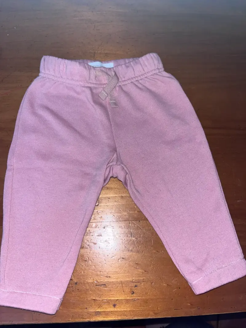 Pantalones rosados para bebé 6M
