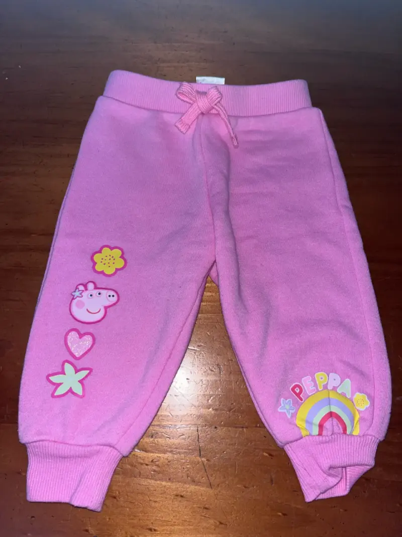Pantalones rosados Peppa Pig para niña