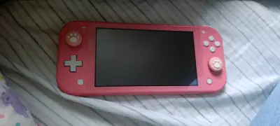 Consola Nintendo Switch Lite rosa en buen estado - miniatura 2