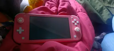 Consola Nintendo Switch Lite rosa en buen estado - miniatura 3