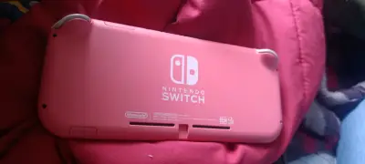 Consola Nintendo Switch Lite rosa en buen estado - miniatura 4