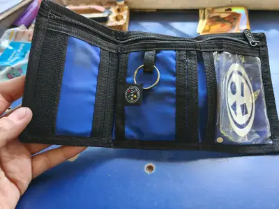 Billetera de tela azul con compartimentos - miniatura 2