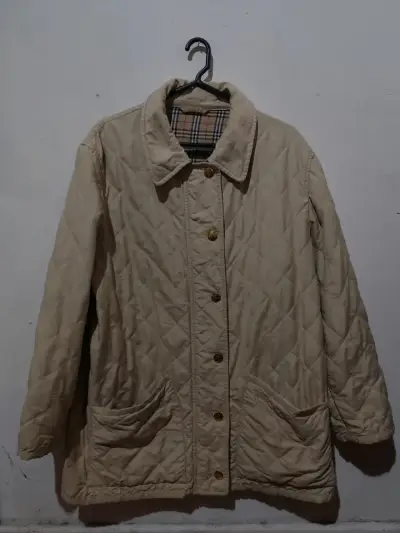 Chaqueta acolchada beige con forro a cuadros - miniatura 1