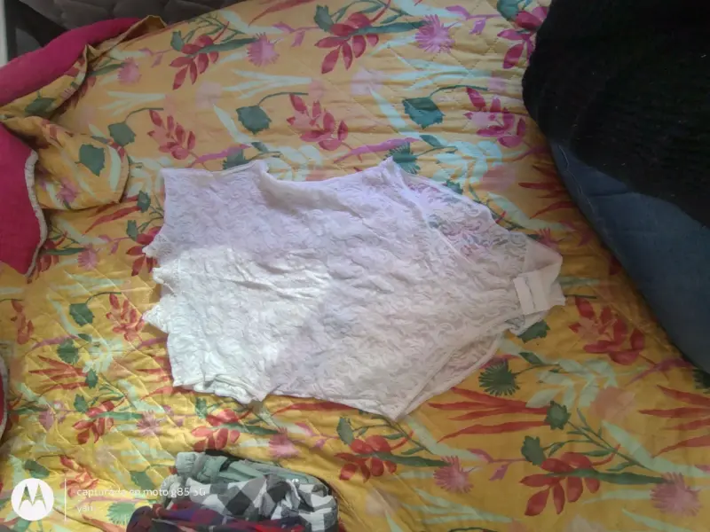 Blusa de encaje blanca sin mangas