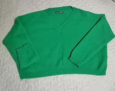 Suéter verde de lana para mujer - miniatura 1