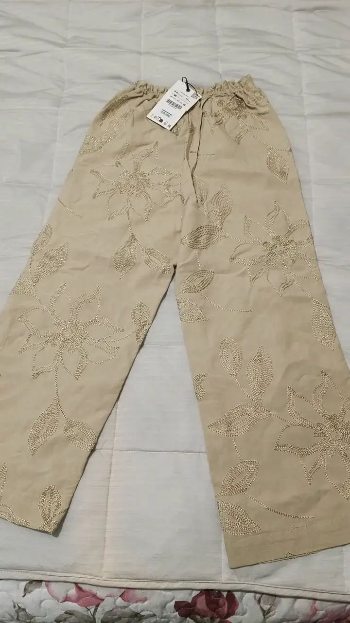 Pantalones beige bordados para niña - 1